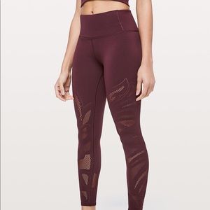 Maroon Lululemon cutout leggings.